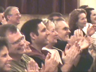 Corporate Audience having fun at a corporate comedy event with Bruce James Comedy Stage Hypnotist. 