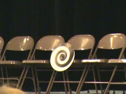 Stage hypnotism demonstrates the power of focus and involves audience participation.