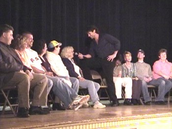Bruce James interacts with audience participants in the trance state demonstrating heightened states of awareness.
