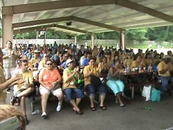 Standing room only crowd is amazed and inspired by the demonstrations of the comedy hypnosis show.